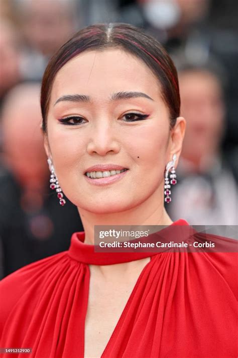 Gong Li attends the "Indiana Jones And The Dial Of Destiny" red... News