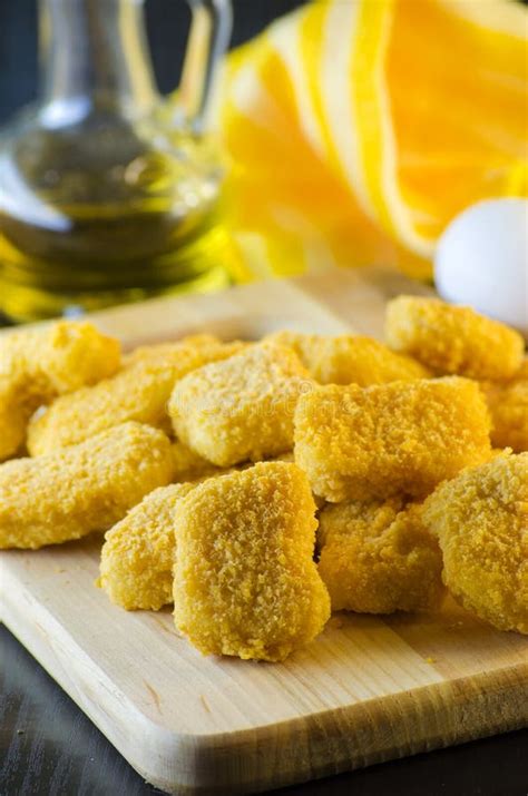 Raw chicken nuggets stock image. Image of board, nuggets - 89190173