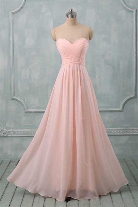 fabricchiffon colorpink hemlinefloor length neckline