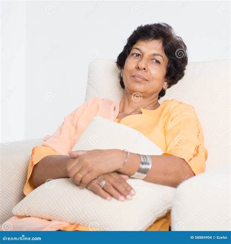Tired Indian mature woman stock photo. Image of indian - 58884904