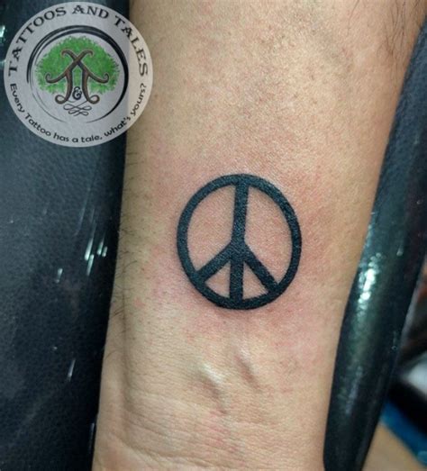 81 Impressive and Alleviating Peace Wrist Tattoo Designs – Ink of ...