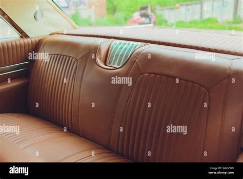 Old leather vintage car seat detail. interior of the old car Stock Photo - Alamy