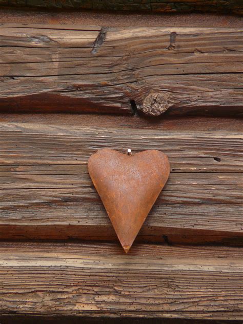 750x1334 wallpaper | brown wooden heart shape ornament | Peakpx