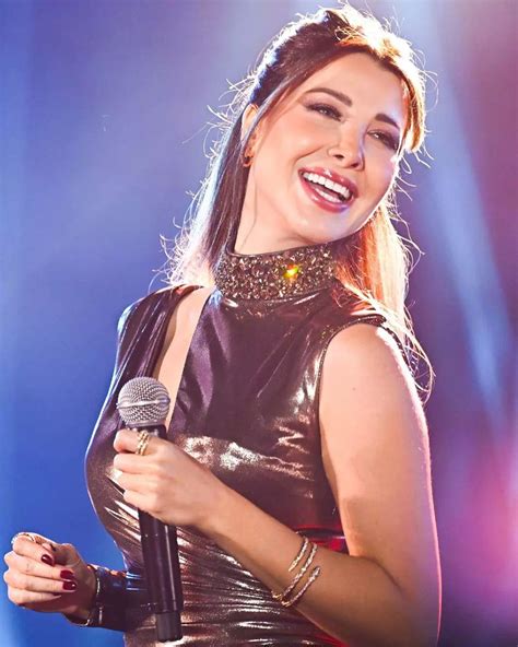 Nancy Ajram performs in Cairo | About Her