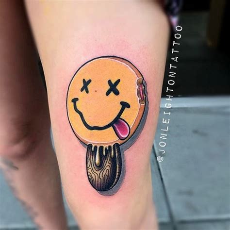 Nirvana Smiley Face Logo Tattoo