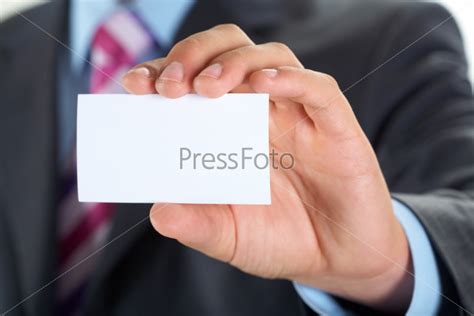 Фотография на тему Чистая визитка в мужской руке | PressFoto