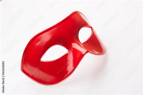 red mask Stock Photo | Adobe Stock