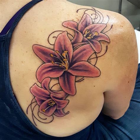 lily flower tattoo designs meaning tenderness luck