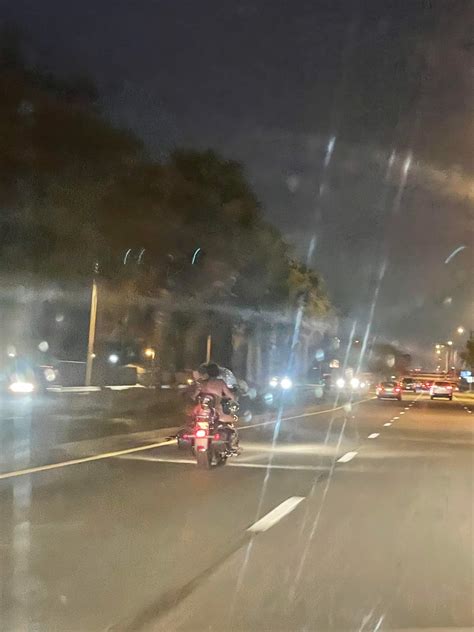 naked woman  motorcycle   stir sunday  lake
