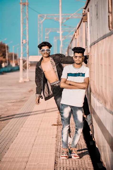 Two boys posing roadside - PixaHive