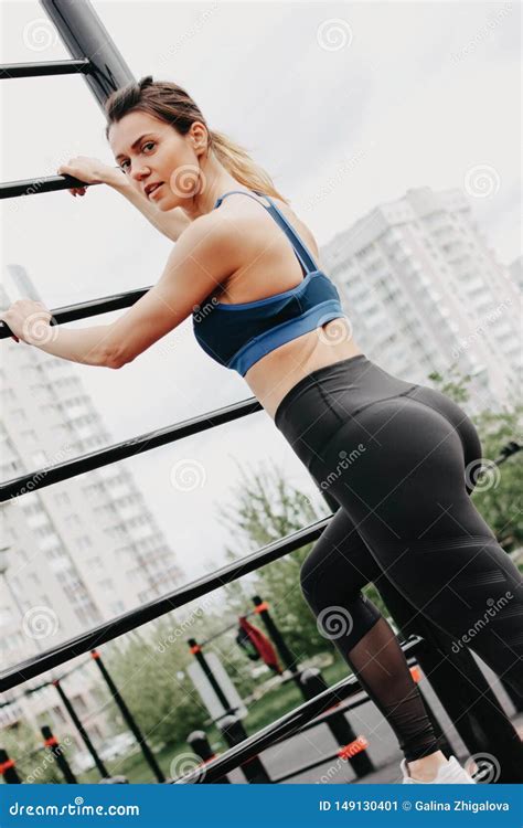 Attractive Fit Young Woman in Sport Wear Rest on Street Workout Area ...