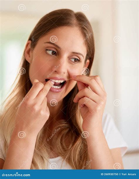 Helping To Prevent the Build-up of Plaque and Cavities. a Young Woman