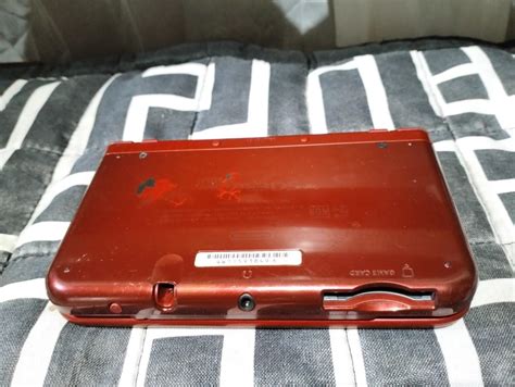 nintendo ds xl metallic red video gaming video game consoles
