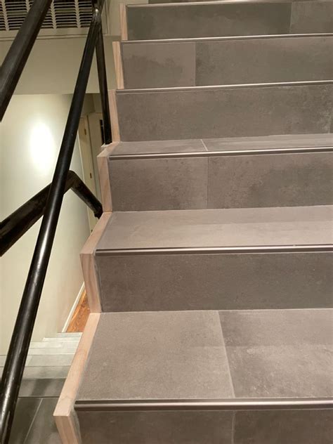 Modern Tile Stairs with Grey Tile and White Pine Trim