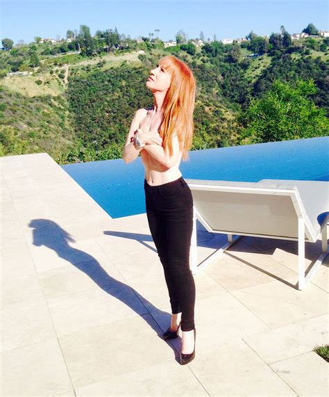 Kathy Griffin Goes Topless in Poolside Photo, Wears Louboutins