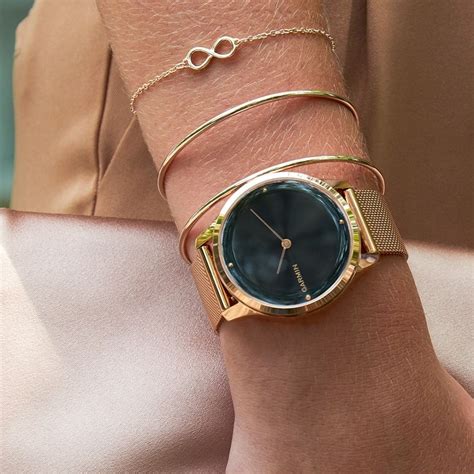 Купить Garmin Vivomove Luxe розовое золото PVD 18K ремешок миланского ...