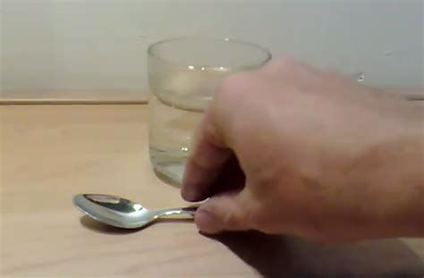 Gallium spoon melts in hot water.