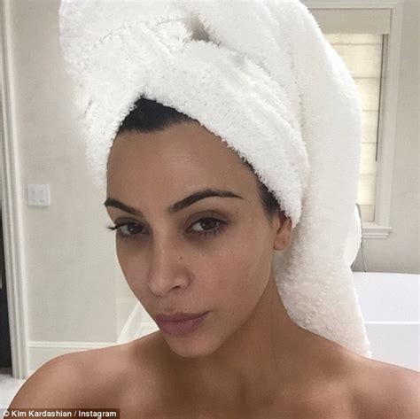 Kim Kardashian in nothing but a towel for bathroom selfie | Daily Mail ...