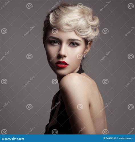 Beautiful Blonde Woman. Retro Fashion Image. Stock Photo - Image of
