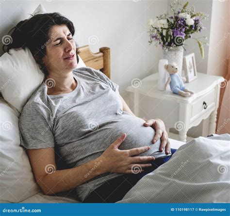 Pregnant Mom In Labor Royalty-Free Stock Photography | CartoonDealer