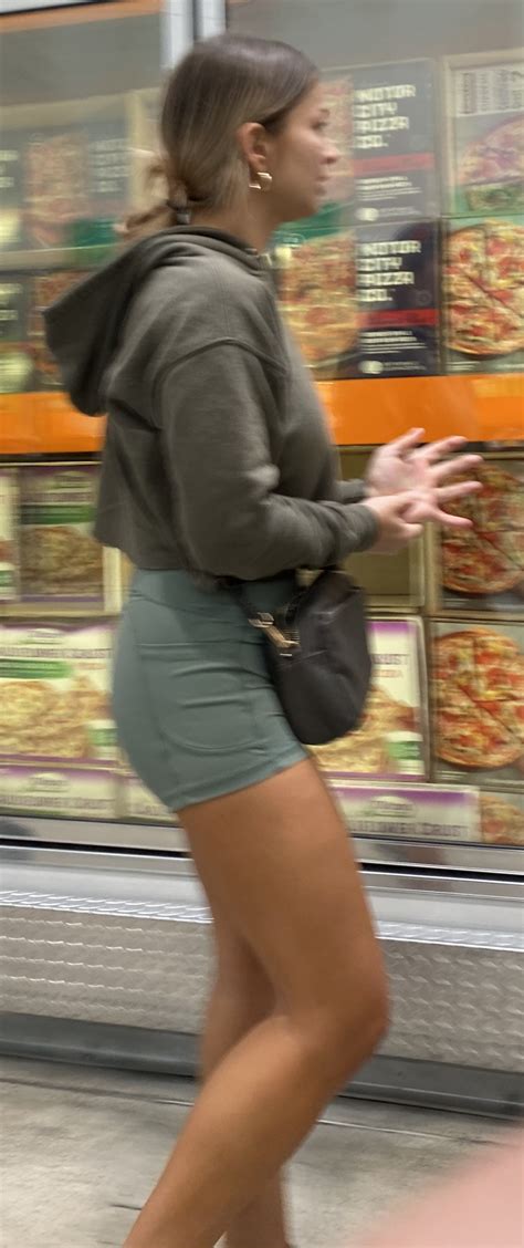 Fit Tan teen ass about to burst out of spandex shorts - Short Shorts