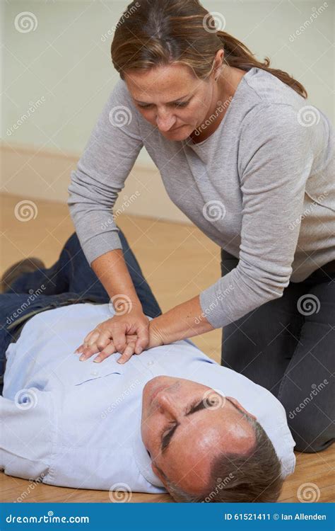 Woman Performing CPR On Man Collapsed On Floor Royalty-Free Stock Photo | CartoonDealer.com ...