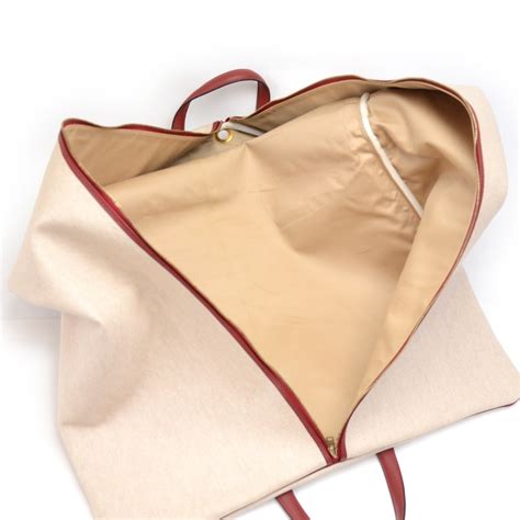 Hermes Hermes Beige Coated Canvas & Red Leather Garment Traveling Bag