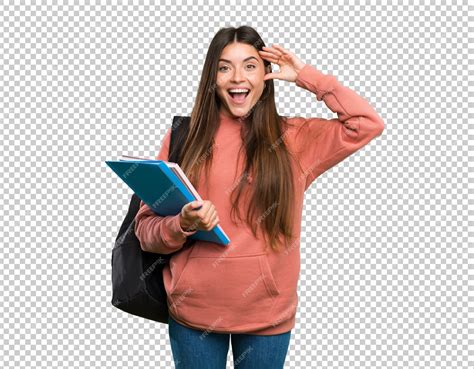 Premium PSD | Young student woman holding notebooks with surprise