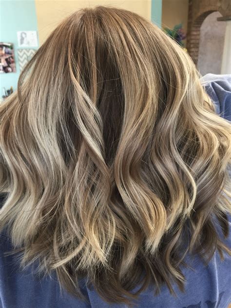 Stylists are currently arguing about the best blonde balyage method 16
