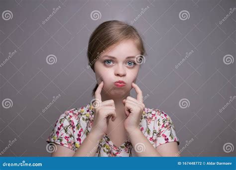 young chubby caucasian woman girl  chubby cheeks stock photo