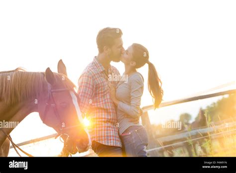 Woman kissing horse hi-res stock photography and images - Alamy