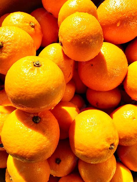 vibrant fresh satsuma mandarin   neutral background