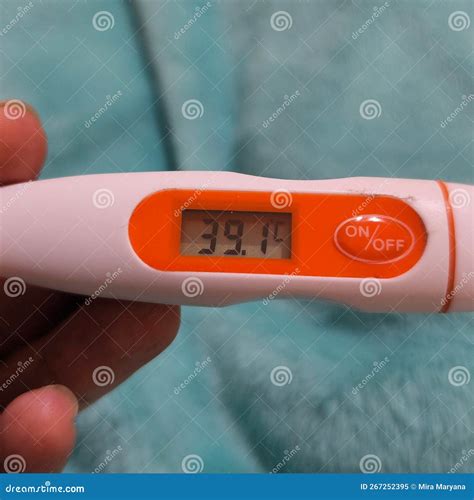 A Thermometer Shown the Result of Body Temperature Measure of 39 Degree ...