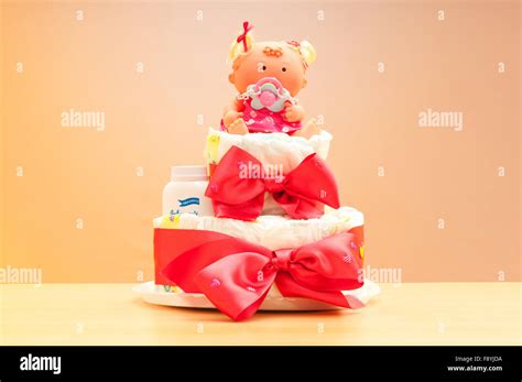 Cakes made of diapers on white Stock Photo - Alamy