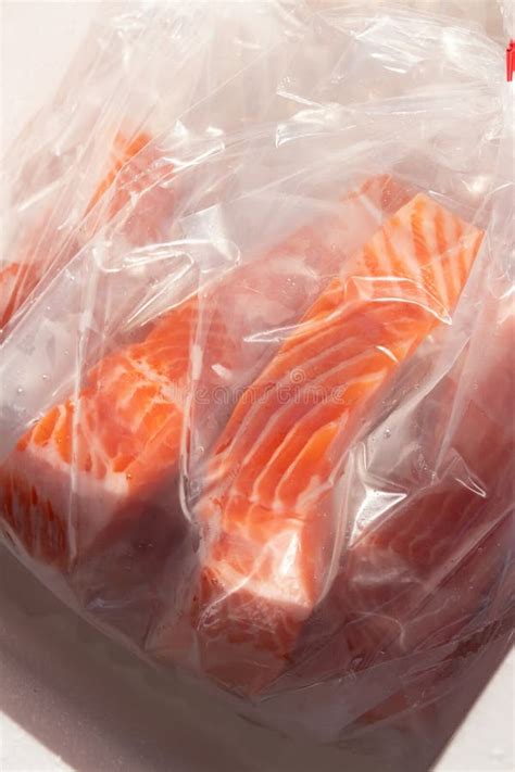 Fresh Salmon Fillets in Vacuum Packaging Stock Photo - Image of premium ...