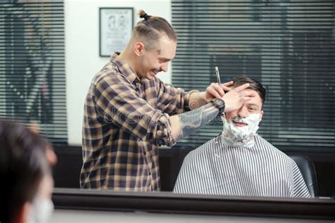 Client Shaving At Barber Shop Stock Photo - Image: 52674816