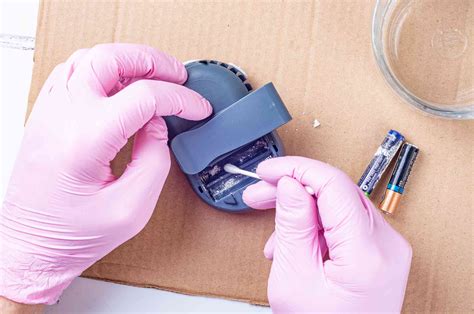 how to clean battery acid out of a remote