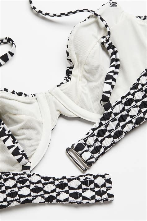 Non-padded bikini top - Black/Patterned - Ladies | H&M IE