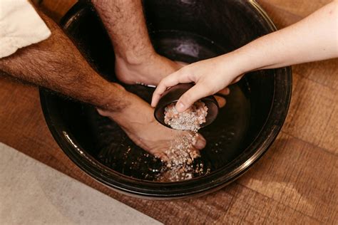 Man Soaking Feet in Spa · Free Stock Photo