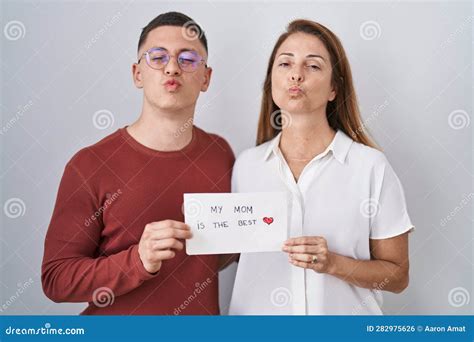 mother  son holding  mom    card    camera