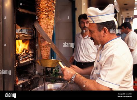 Man cutting kebab Antalya Antalya Turkish Riviera Turkey Stock Photo ...