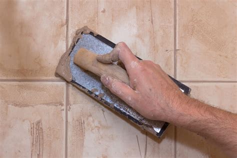 how long for grout to dry before showering