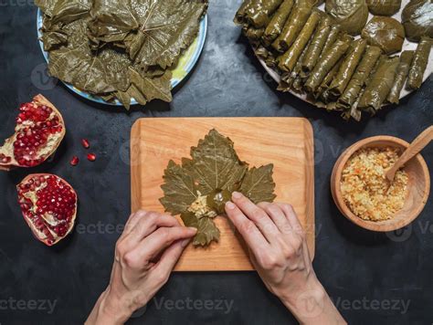 Stuffed Grape Leaves. Preparation of Dolma from grape leaves. 22215899 ...