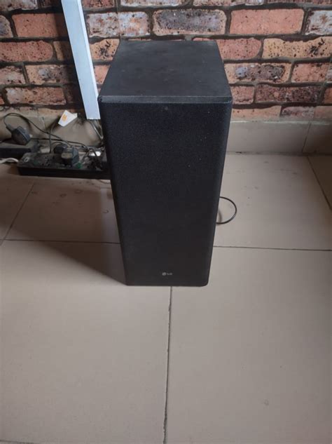 LG Sound Bar SK5 With Wireless Subwoofer + LG Subwoofer For The Sound ...