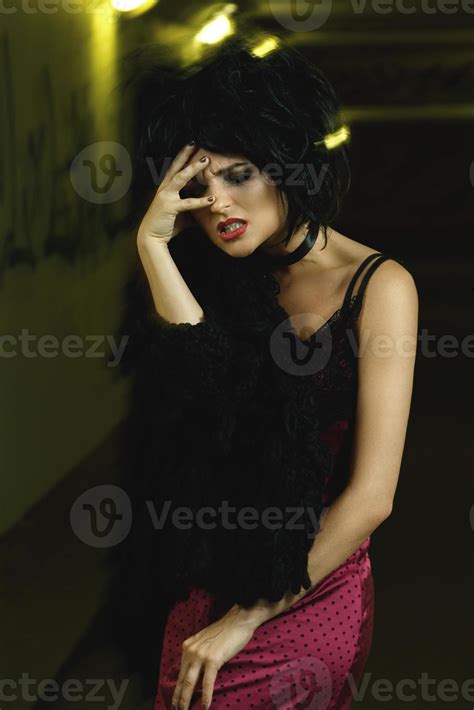 Strange and freaky woman in the dark tunnel 14346253 Stock Photo at