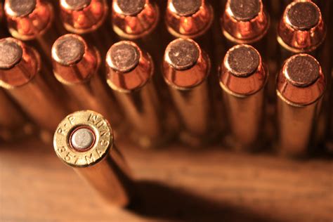 Online crop | brass-colored bullet lot, weapon, bullet, magnum ...