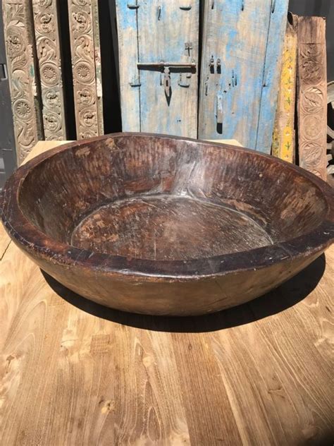 wooden jar sticks  stones outdoor