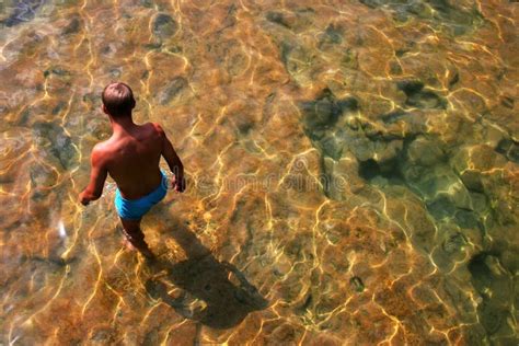 Men in water stock image. Image of holiday, watch, blue - 3149547