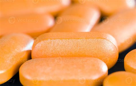a long orange pill 9415429 Stock Photo at Vecteezy