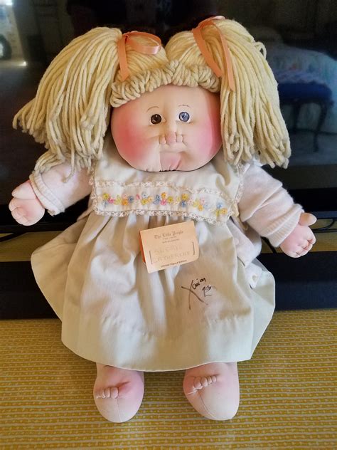 Collectors hunt for Cabbage Patch dolls for sale at auctions 31
